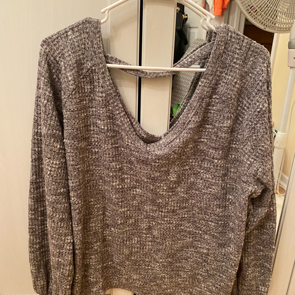 Gray off the shoulder sweater with a v-neck back.